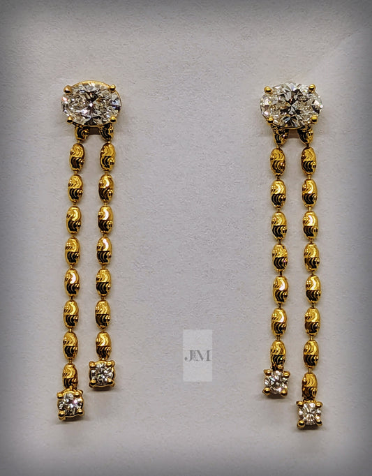 14k drop earrings with one carat each oval shape earrings... 2.3ct ctw