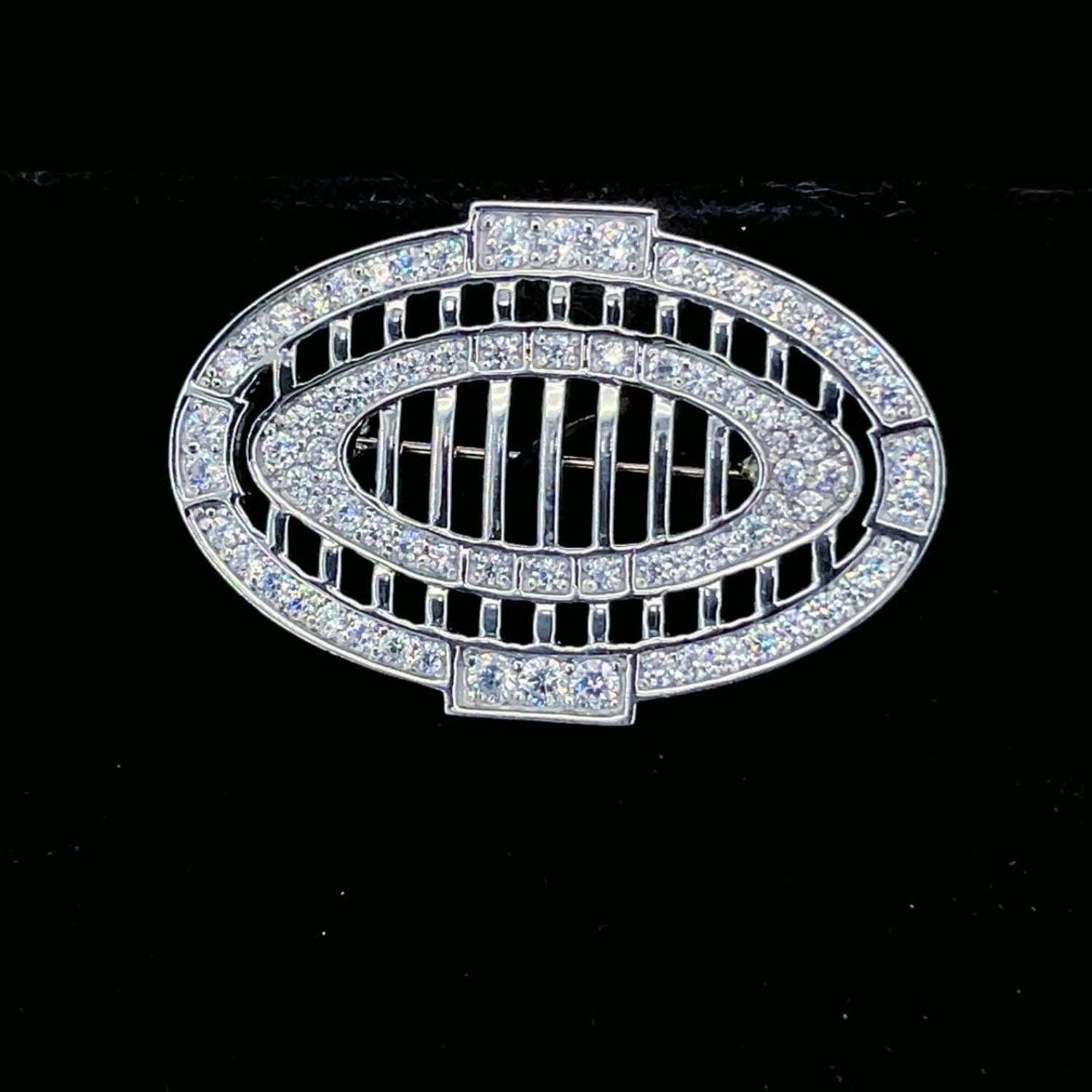 James Mack original automotive-inspired diamond-set luxury car ring design on black background