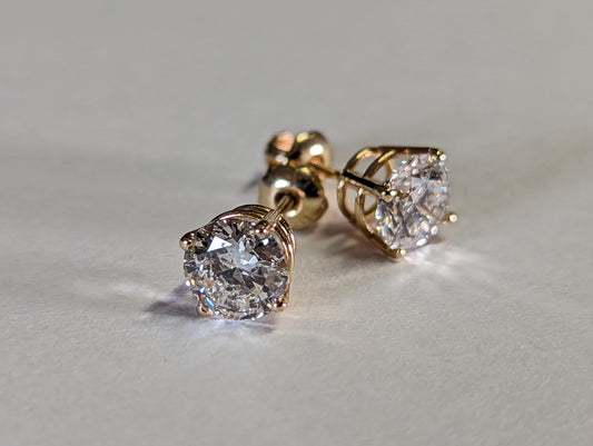 1 carat each stud Lab diamonds.. 14k yellow gold