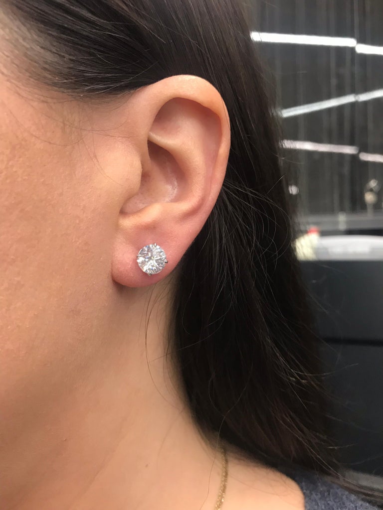 1 carat each stud Lab diamonds.. 14k yellow gold