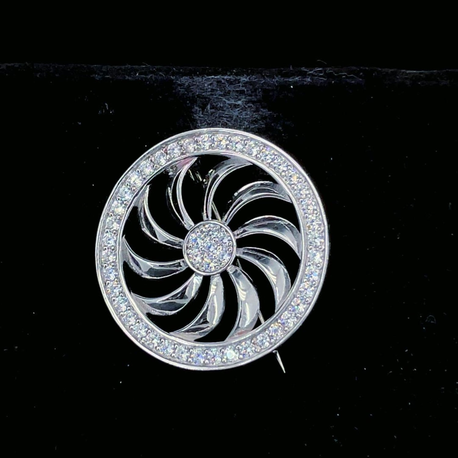 Original James Mack turbine-inspired circular diamond-set design